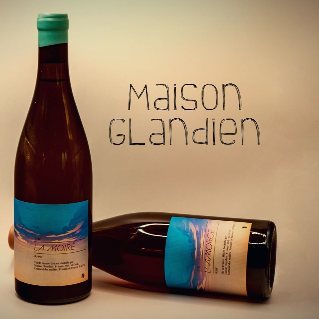 Bottles of wine marked Maison Glandien by Tino Kuban.