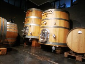 Bottles and wine flasks in the cellar of Marco Pezzuto.